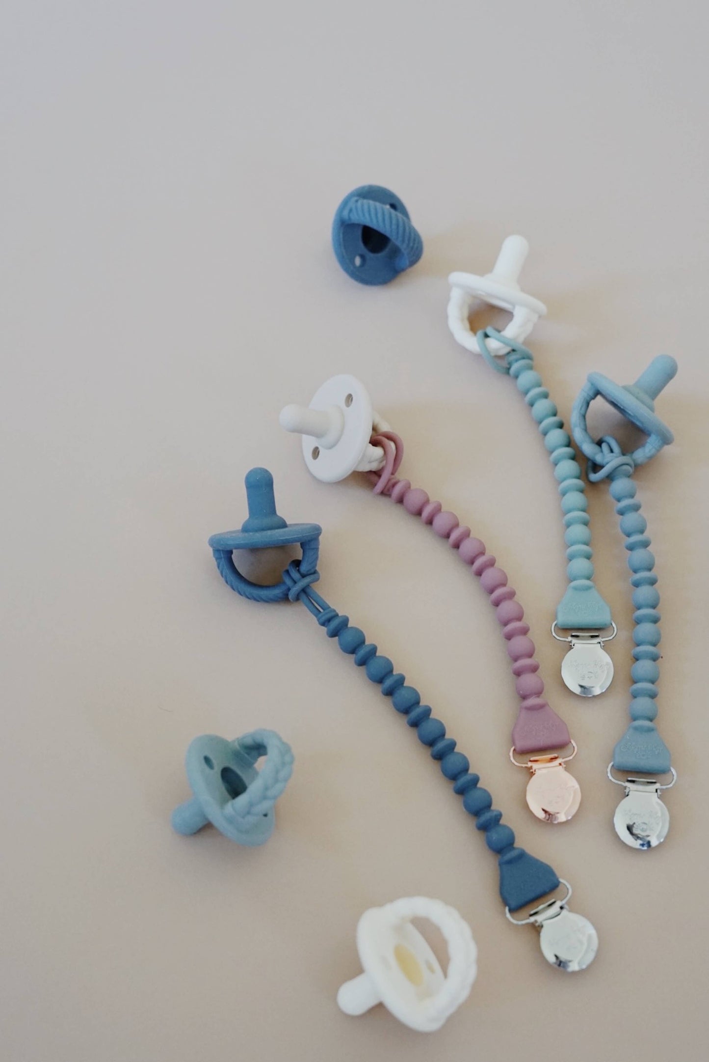 Itzy Ritzy - Sweetie Strap™ Silicone One-Piece Pacifier Clips: Buttercream