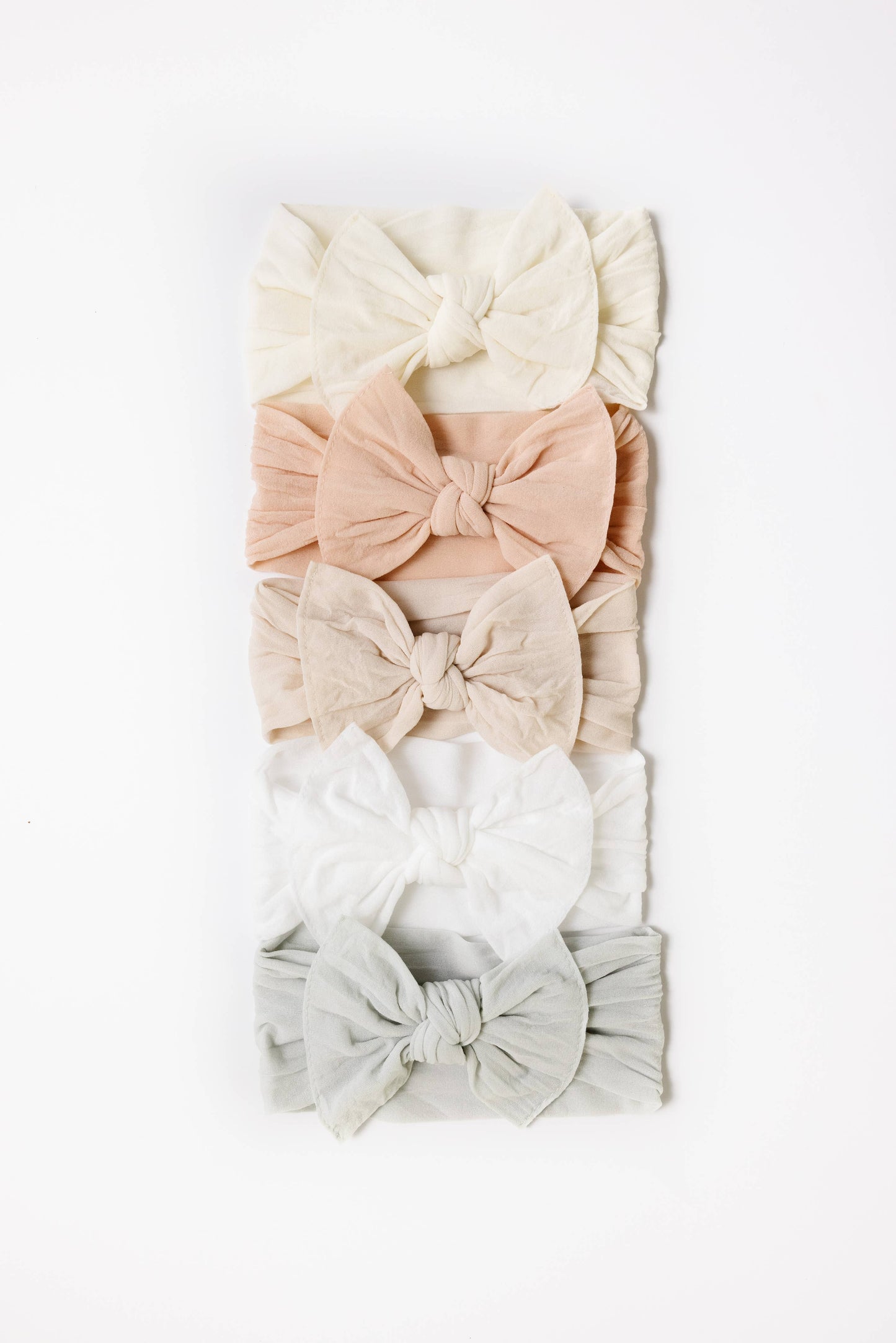 Baby Bling Bows - THE KNOT Soft nylon headband: white